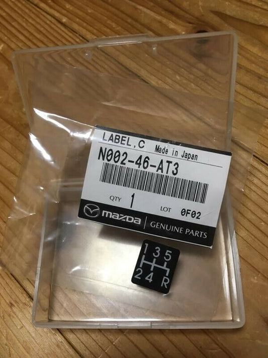 Mazda Miata Center Console Change Label N002-46-AT3 F/S Genuine